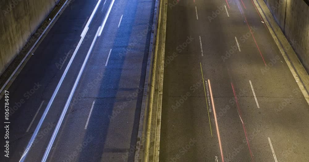 Cinemagraph of night scene urban, (04) underground traffic in motion and static traffic surface.Time Lapse - - 4K. Smooth motion camera: TILT - ZOOM and two seconds fixed plane to end. Cinemagraph of night scene urban, (04) underground traffic in motion and static traffic surface.Time Lapse - - 4K. Smooth motion camera: TILT - ZOOM and two seconds fixed plane to end.