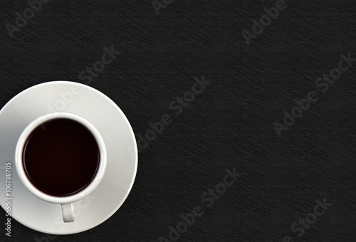 3D rendering coffee cup on black stone table