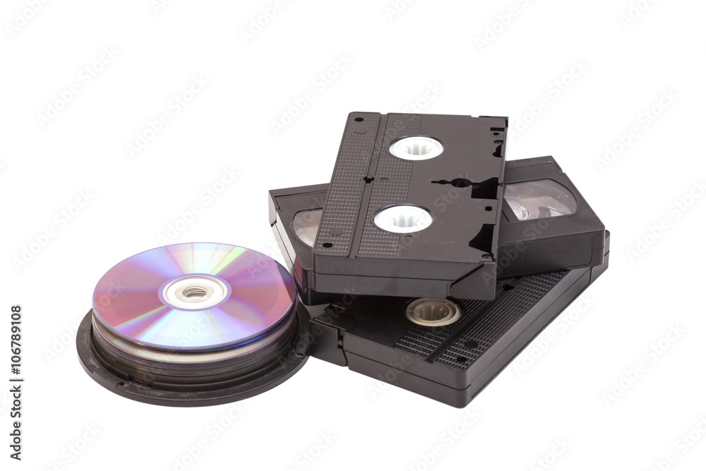 Video Cassettes And CD discs isolated on white background