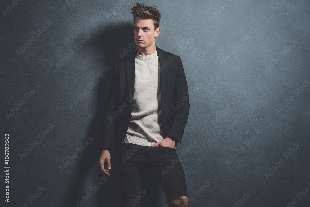 Fashionable casual young man wearing dark blue jacket and black Fashionable casual young man wearing dark blue jacket and black