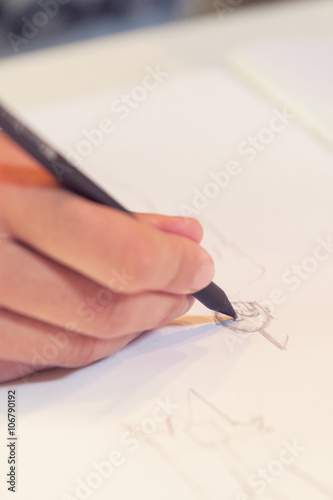 Female hand drawn, student