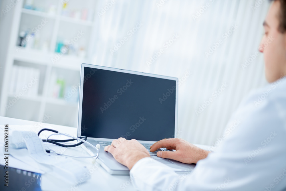 Doctor with notebook on the desk Doctor with notebook on the desk