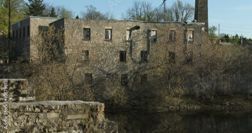 Ruins of old bridge and factory in Elora, Ontario, Canada. Elora is a community known for its limestone architecture, its artistic community and the Elora Gorge
 photo