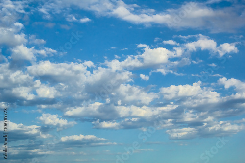 White picturesque clouds in the blue sky