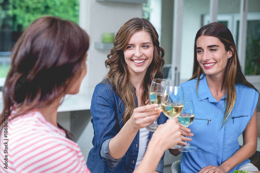 Friends toasting glass of wine Friends toasting glass of wine