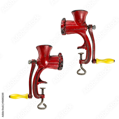 фотографія Old manual meat grinder unassembled isolated on white background