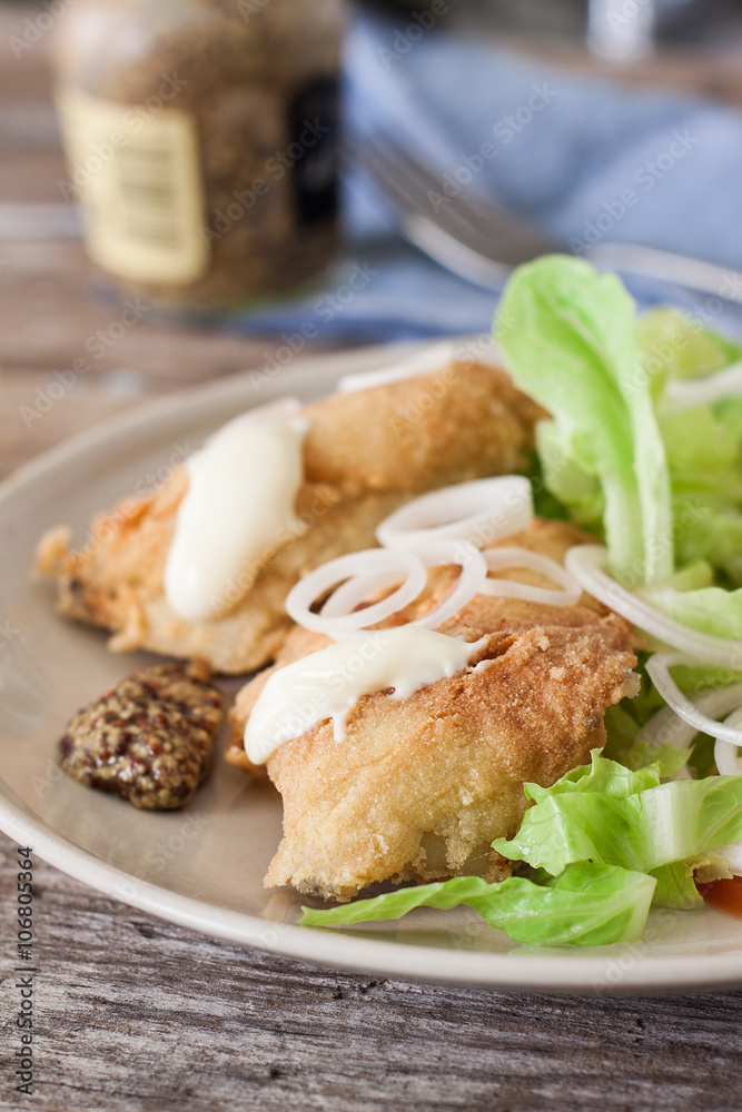 Fried cod and salad