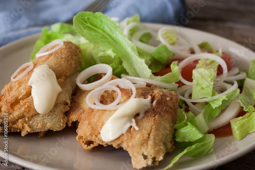 Fried cod and salad