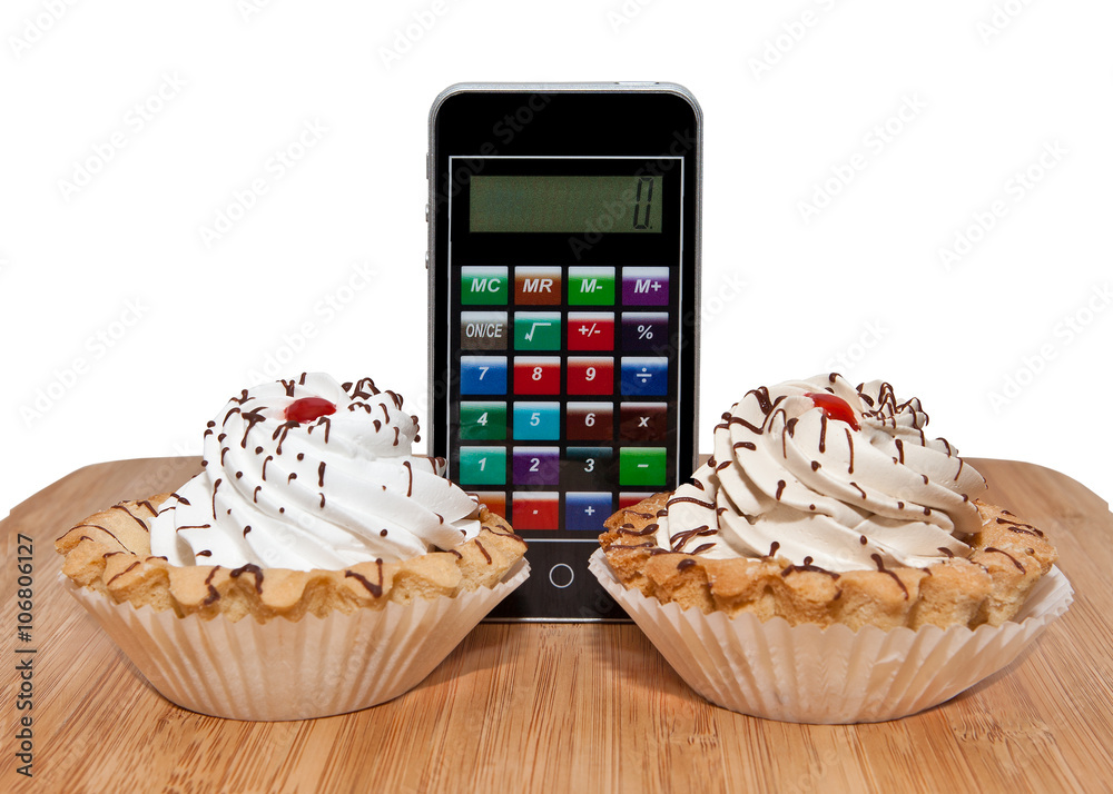 Cakes tarts with a calculator. The concept of counting calories. Stock