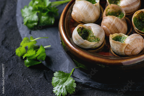 Fototapeta Naklejka Na Ścianę i Meble -  Ready to eat Escargots de Bourgogne snails