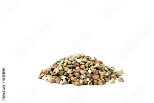 handful of green buckwheat closeup isolated