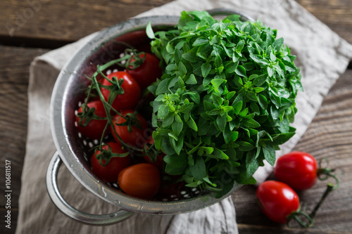 Fresh ingredients, tomatoes, herbs, olive oil
