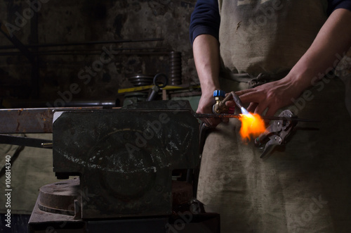 Craftman keep welding tool in a hand