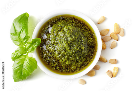 Green pesto sauce, pine nuts and basil