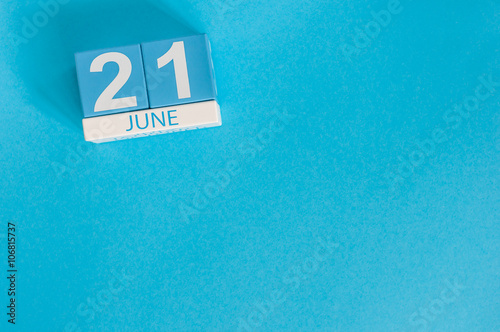 June 21st. Image of june 21 wooden color calendar on blue background. Summer day. Empty space for text. Go Skateboarding Day