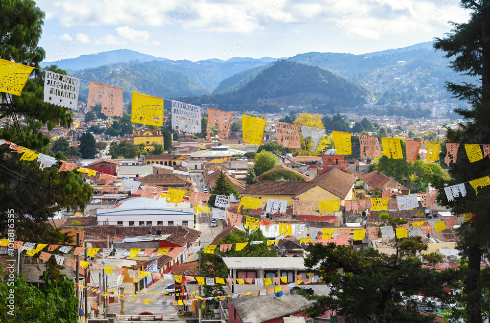 Aerial view to San Cristobal de las Casas with numerous religious flags