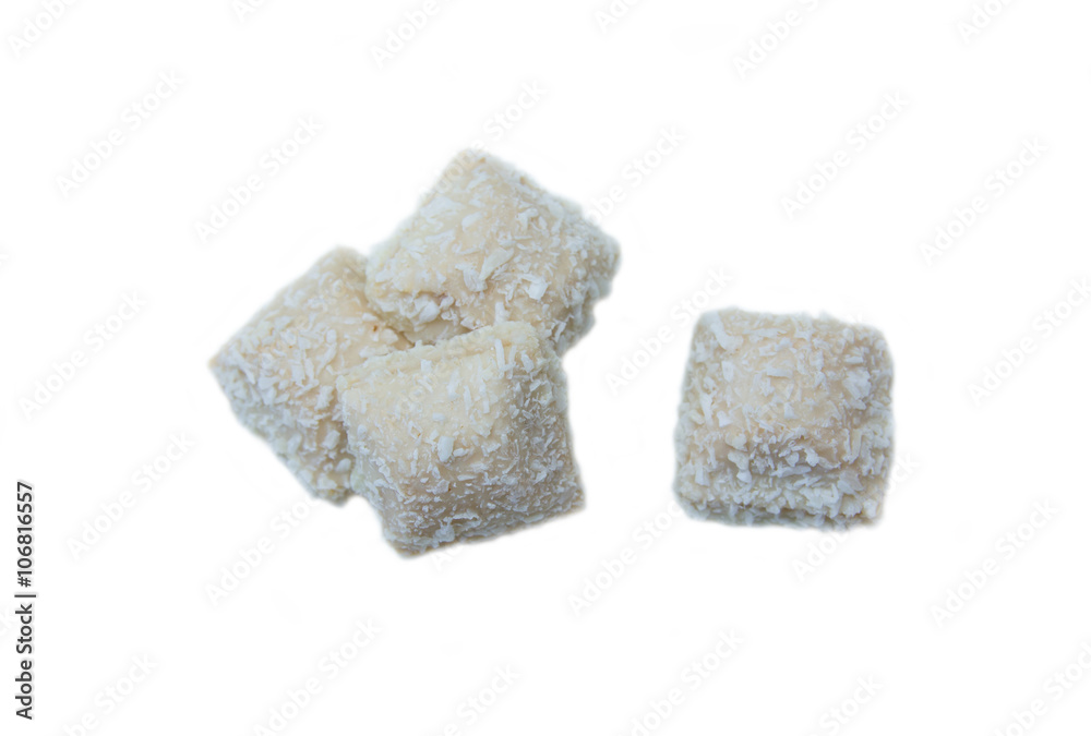 Cakes with coconut on a white background seen from above Cakes with coconut on a white background seen from above