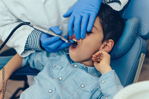 Professionally cleaning child s teeth