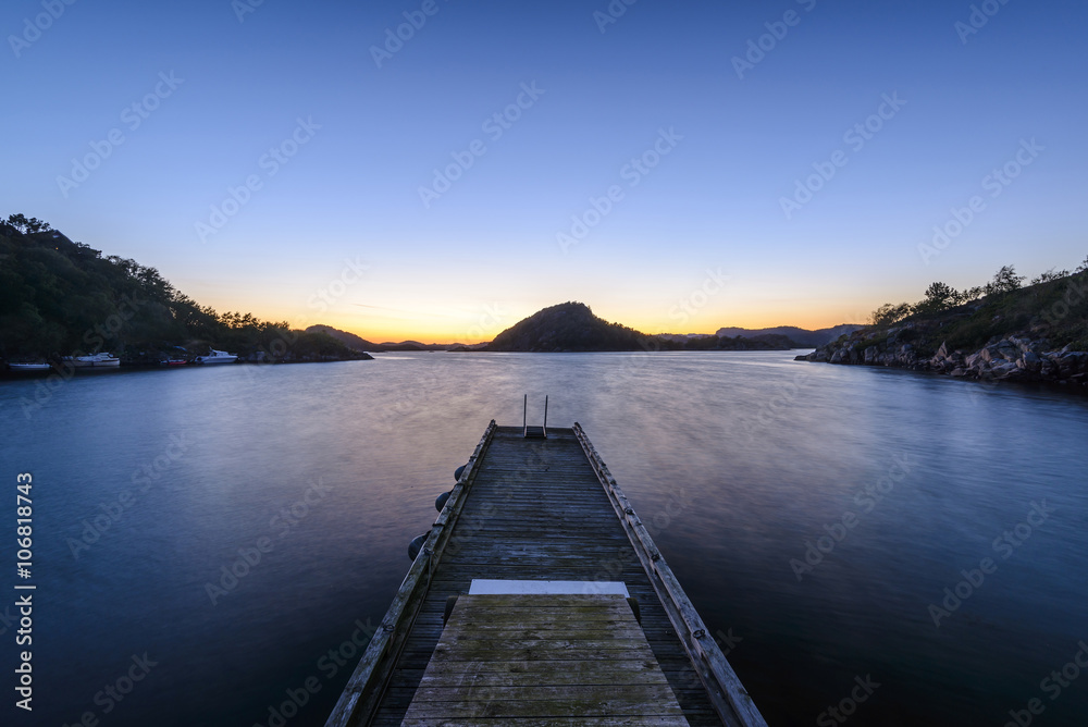 scenic fjord landscape in the evening after sundown, south of Norway, Europe
