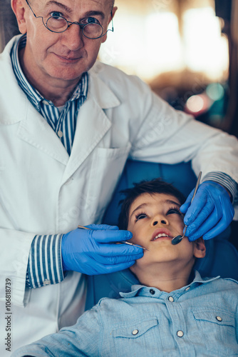 Dentist with little boy
