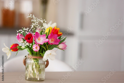 Bouquet of beautiful colorful tulips on blurred background
