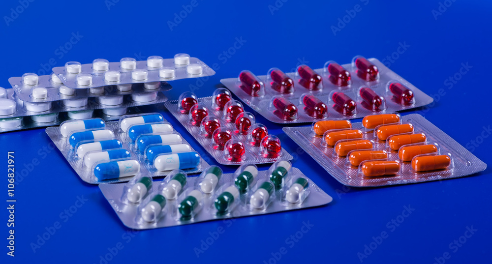 Selection of different pills in form of tablets and capsules Selection of different pills in form of tablets and capsules