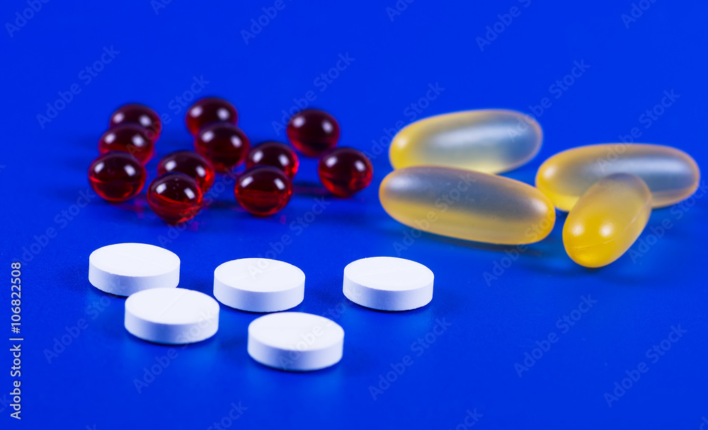 Selection of different pills in form of tablets and capsules Selection of different pills in form of tablets and capsules