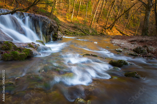Beautiful waterfalls and mountain stream in Transylvania, in early spring