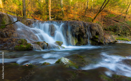 Beautiful waterfalls and mountain stream in Transylvania, in early spring