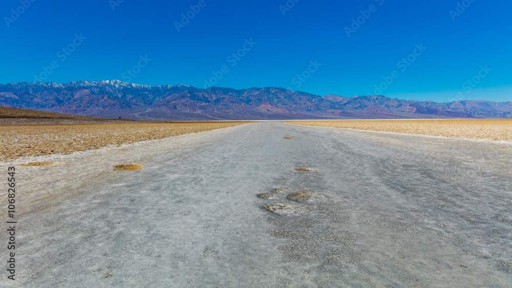 Scenic view of salt planes. The bottom of the dried-up salt sea. The bark of salt. Badwater Salt Flat, Death Valley National Park