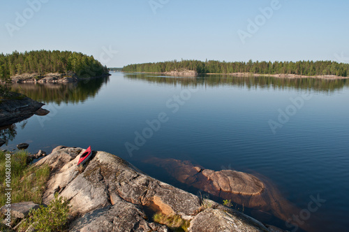 Photography Red kayak on Saimaa lake