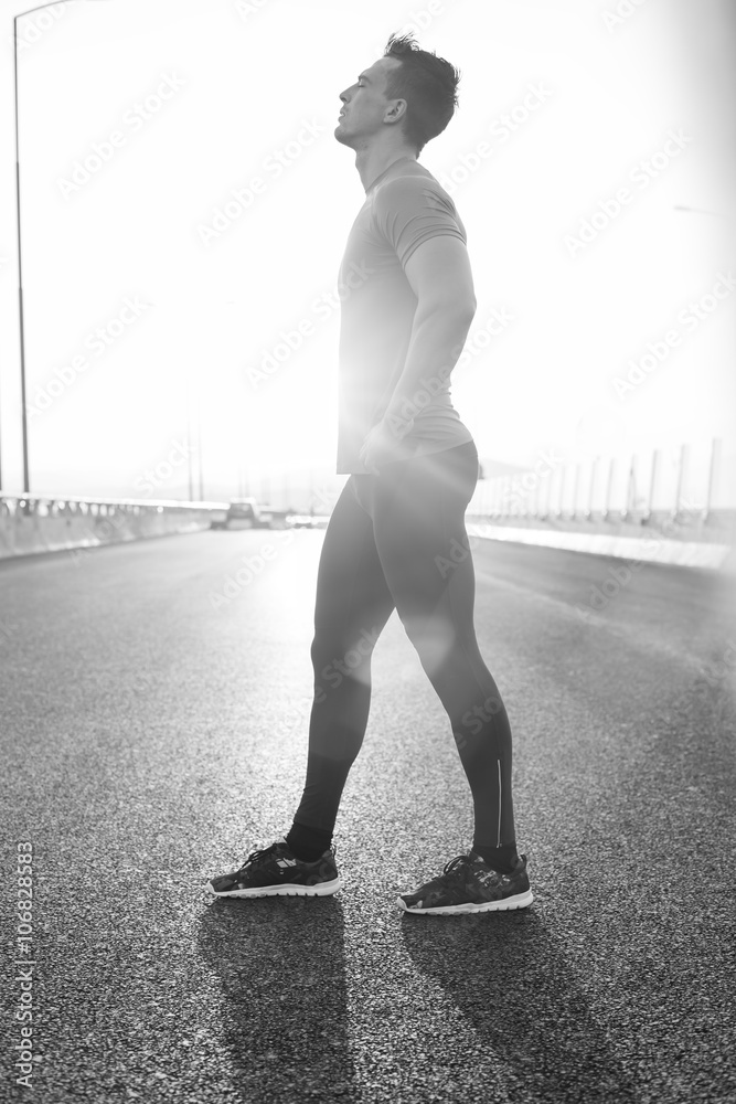 Running man. Male runner at sprinting speed training for maratho Running man. Male runner at sprinting speed training for maratho