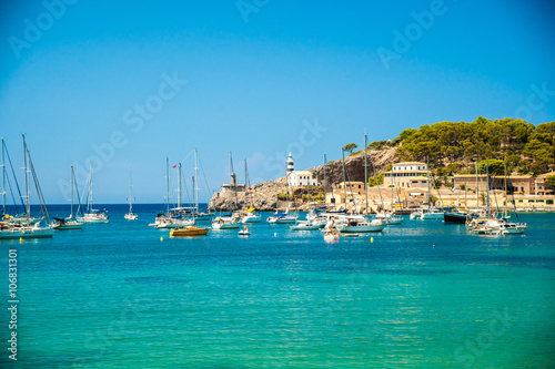 Puerto de Soller, Port of Mallorca island in balearic islands, Spain. Beautiful picture of boats in clear blue water of bright summer day.