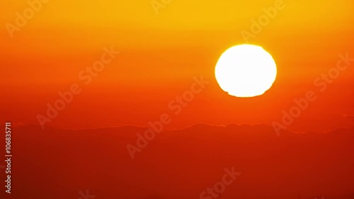 Sun Rising from the Mountain Ridge Timelapse