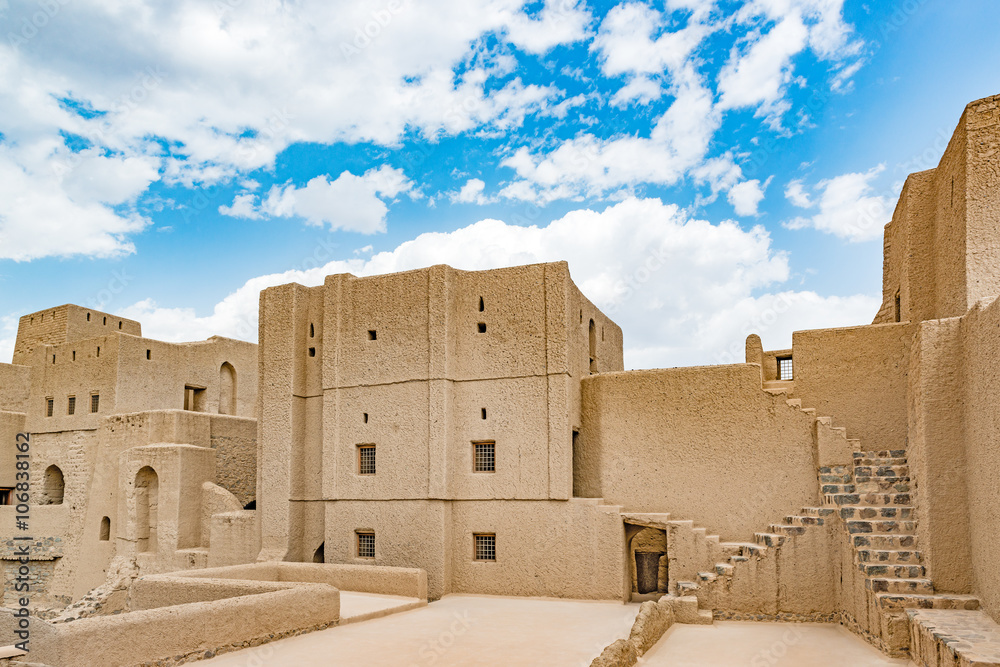 Bahla Fort in Ad Dakhiliyah, Oman. It is located about 40 km away from Nizwa and about 200 km from Muscat the capital. It has led to its designation as a UNESCO World Heritage Site in 1987.