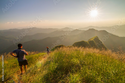 Unidentified Tourism walking on high mountain with sunlight © rukawajung