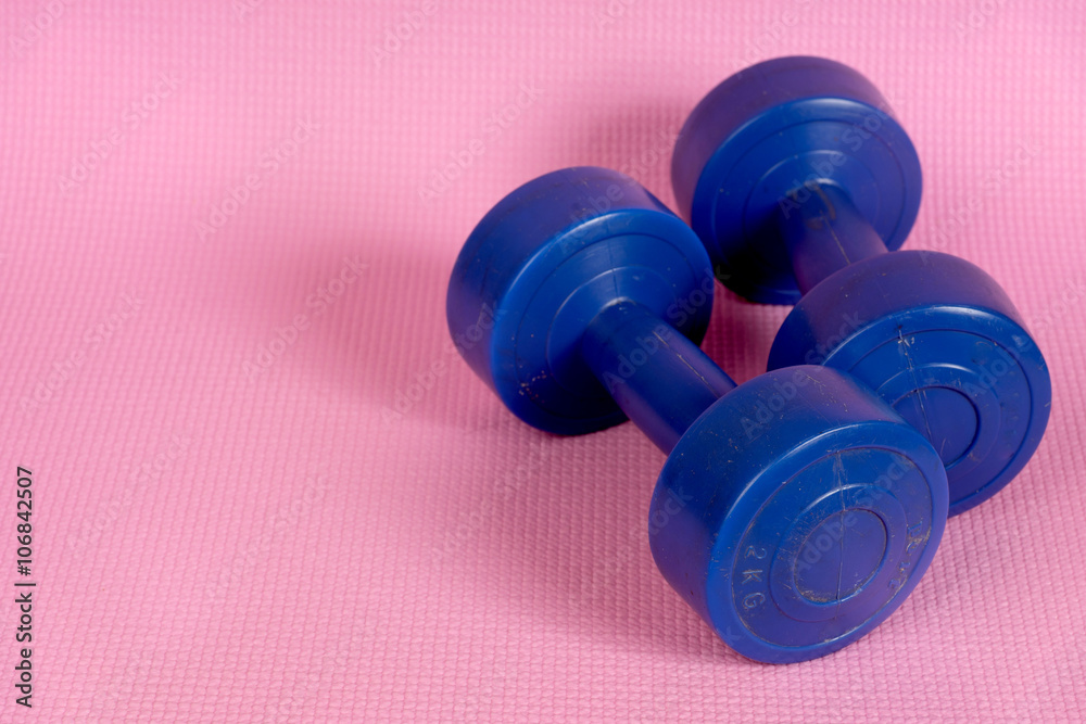 blue dumbells on the pink