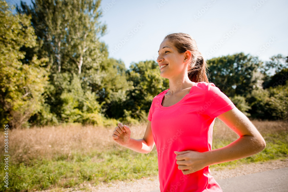 Woman running in park Woman running in park