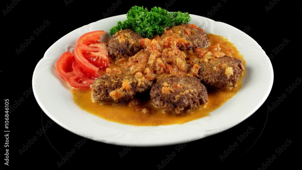 Kofta Kebabs with fried onions and fresh tomatoes