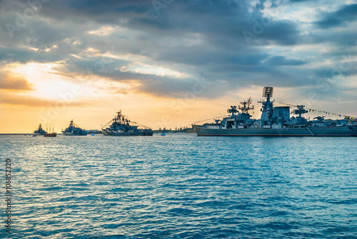 Photography Military navy ships in a sea bay