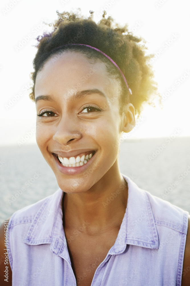 Mixed race woman smiling at beach Mixed race woman smiling at beach