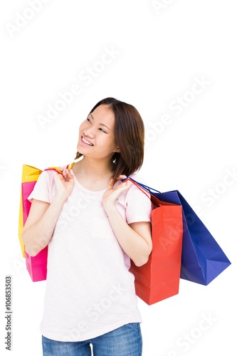 Young woman holding shopping bags