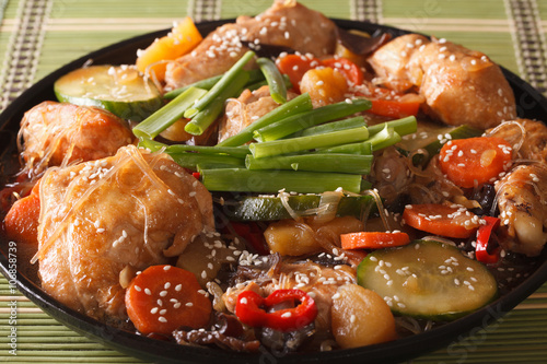 Andong jjimdak braised chicken with vegetables close-up. Horizontal
