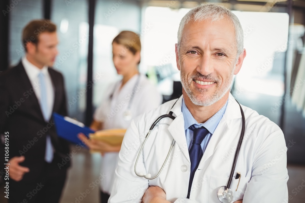 Portrait of a smiling male doctor in hospital Portrait of a smiling male doctor in hospital