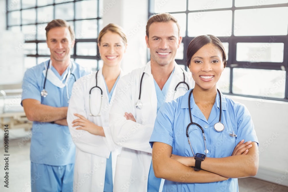 Portrait of medical team standing with arms crossed Portrait of medical team standing with arms crossed