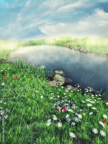 Fototapeta Słoneczny krajobraz z wiosenną łąką i jeziorem