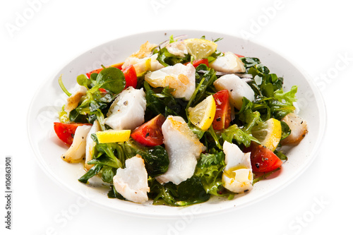 Fish salad - fried cod and vegetables 