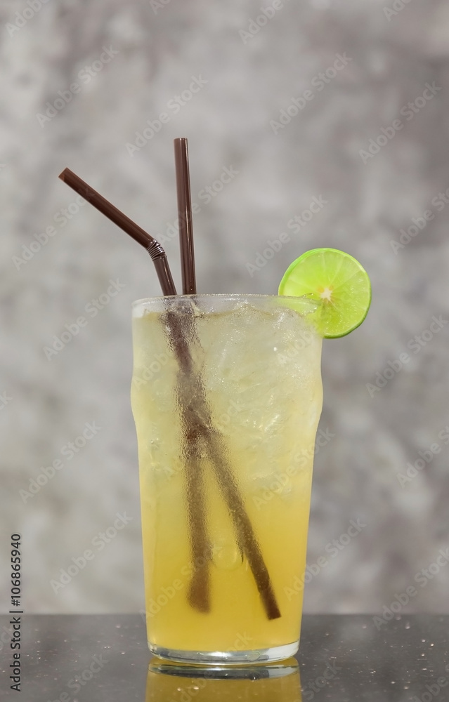 Refreshing iced lemonade served with sliced lemon piece isolated Refreshing iced lemonade served with sliced lemon piece isolated