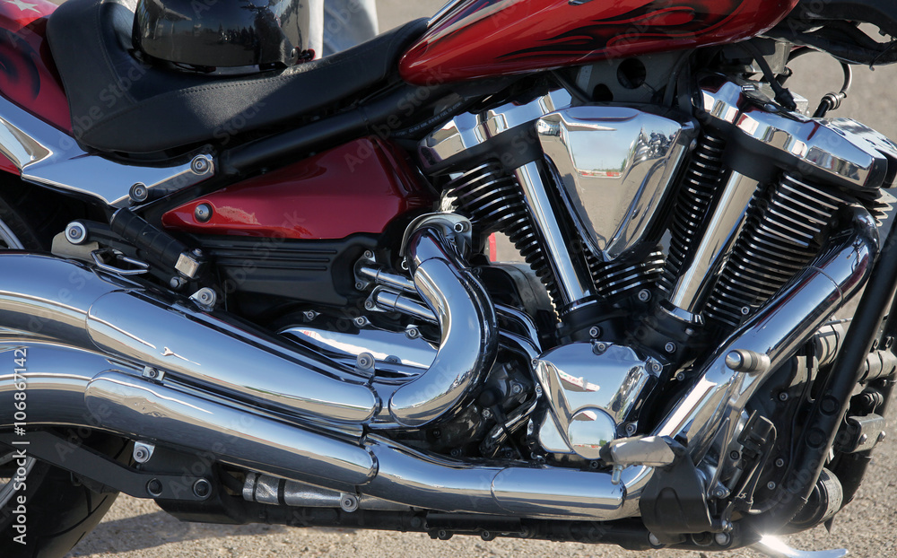 the beautiful, chrome plated, mirror engine of the bike the beautiful, chrome plated, mirror engine of the bike