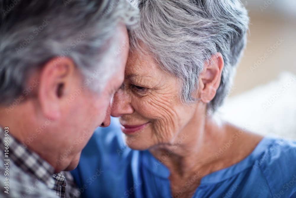 Close-up of senior couple embracing each other Close-up of senior couple embracing each other